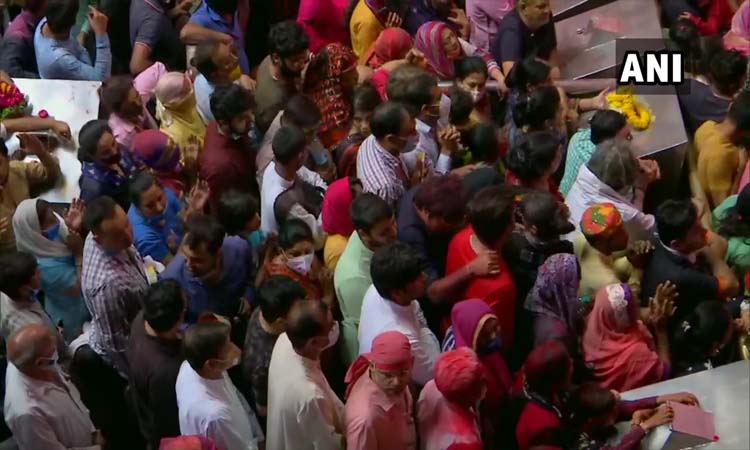 Mathura Devotees gather at Banke Bihari Temple in Vrindavan, on the ocassion of Holi today
