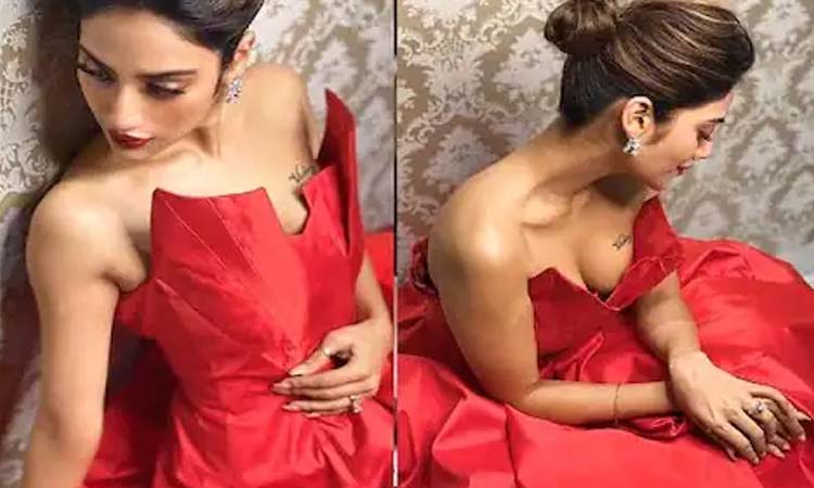 india actress turned mp nusrat jahan flaunts her cleavage tattoo reads victory and the sensual photos goes viral over social media