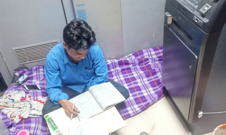 security guards studying were sitting ground near atm machine photo shared ias officer