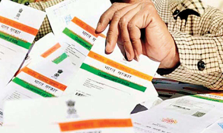how to lock aadhaar card by sending a sms to stop its misuse know easy process