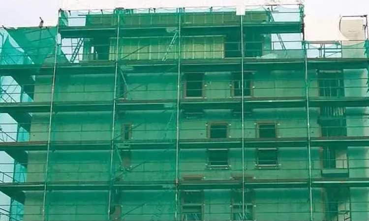 at the time of construction of the building why it covered with green cloth