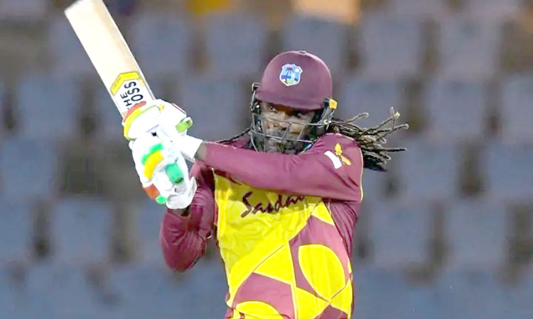 chris gayle becomes the first ever batsman to complete 14000 runs in t20 career the boss the universe boss