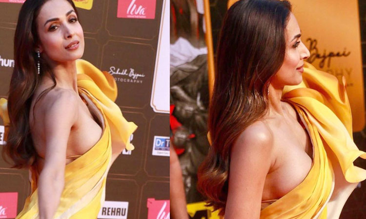 Malaika Arora | malaika arora face oops moment in risque thigh high slit gown viral yellow dress