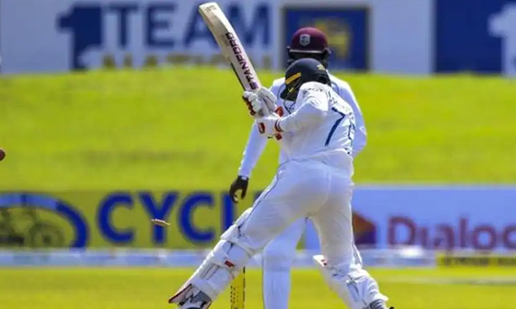 SL Vs WI Test Match | sri lankas dhananjaya de silva gets hit wicket while saving himself from getting bowled watch video marathi news
