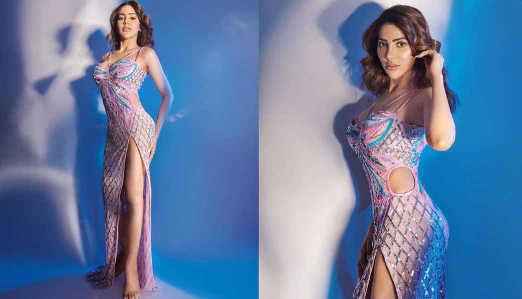 Nikki Tamboli Glamorous Photoshoot | nikki tamboli shared bold photos on social media wearing shimmery gown with thigh high slit nikki tamboli