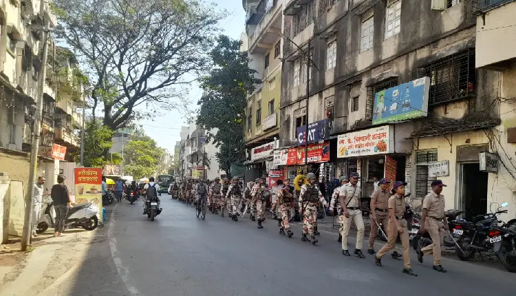Pune Police | Pune police route march in the background of Kasba Peth by-election